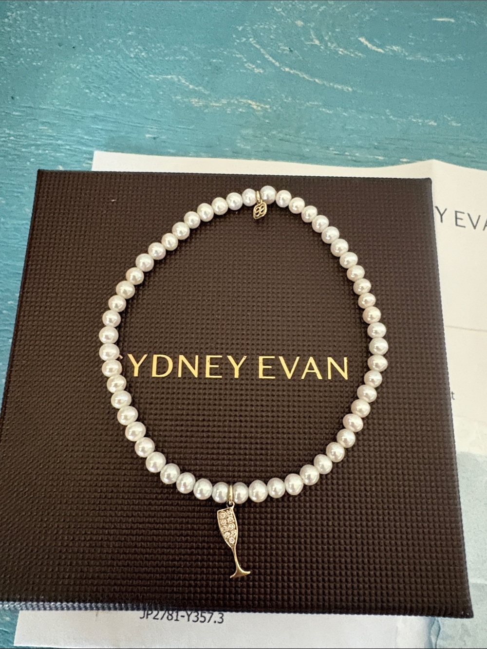 Brand new Sydney Evan, 14ktdiamond champagne glass and pearl bracelet